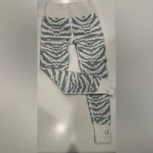 Bombshell Sportswear Zebra Pattern Leggings in Gray and White